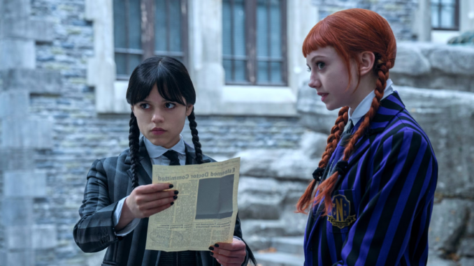 Wednesday addams and agnes looking at an article in wednesday season