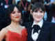 Jenna ortega and winona ryder pose on the red carpet