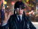 Jenna ortega as wednesday addams holding up an eyeball in wednesday season