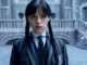 Jenna ortega as wednesday addams looking glum at nevermore (1)